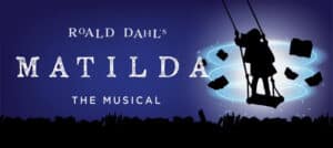 Theatre poster of Matilda with her standing on a swing