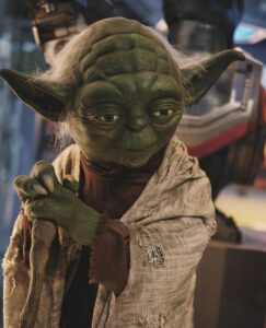 Star Wars Yoda character with green skin.